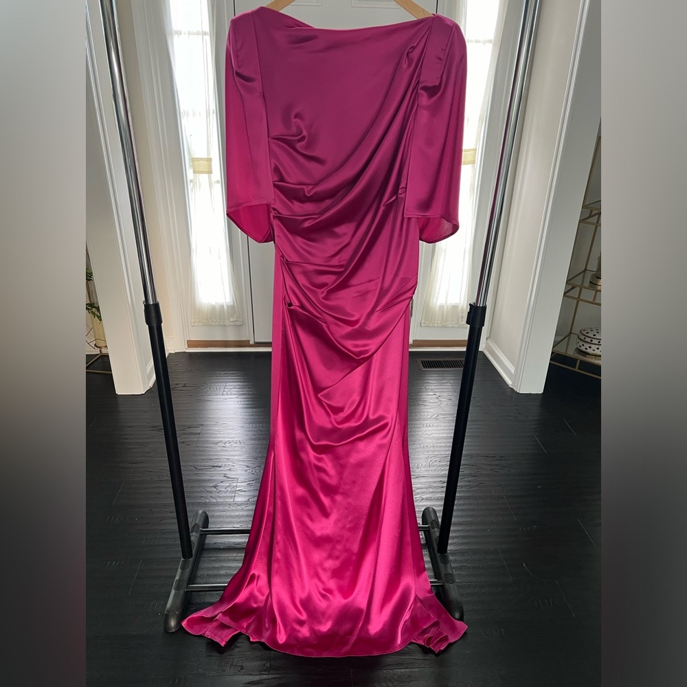 Formal pink floor length cap sleeve Talbot Runhof dress with lining.